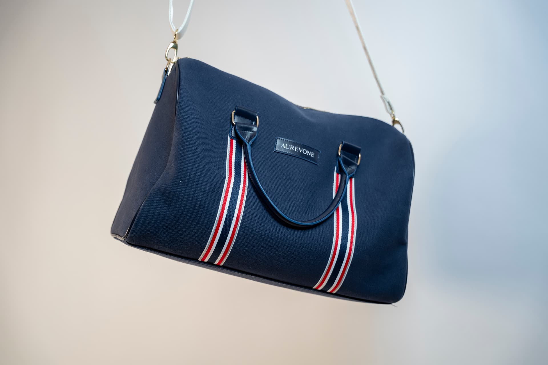 AURÉVONE Canvas Bag i marineblå canvas med skinnhåndtak og stripedetalj